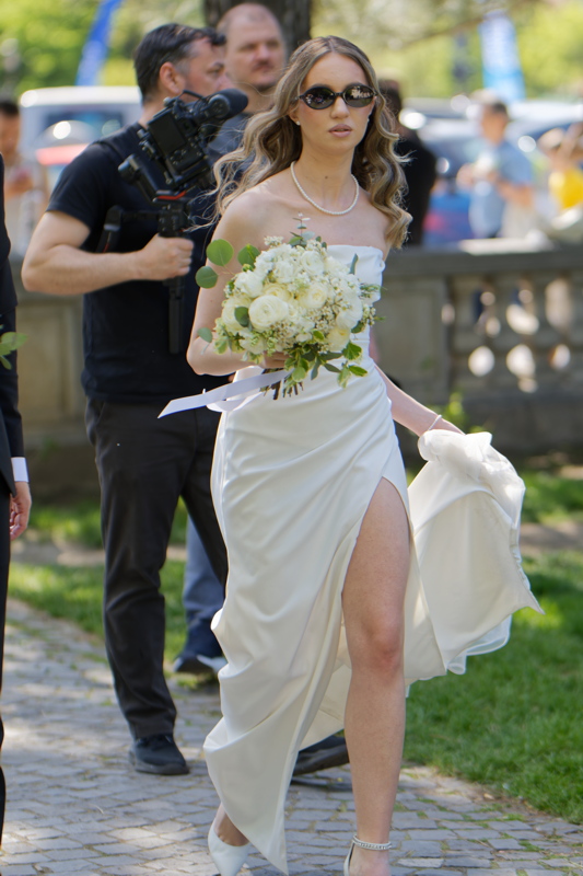 Bridesmaid going on alley